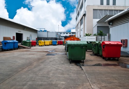 Recycling bins and sorted waste materials