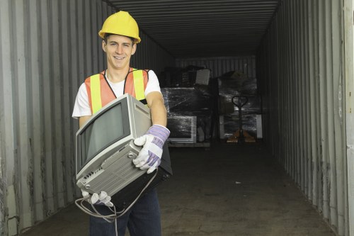 Professional rubbish collection team at work